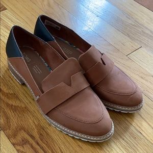 Toms Black and Tan loafers size 9